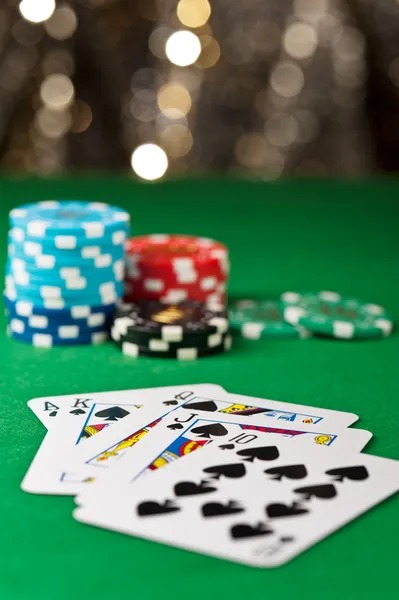 Casino Hold'em hand progression showing ante, community cards, and dealer reveal